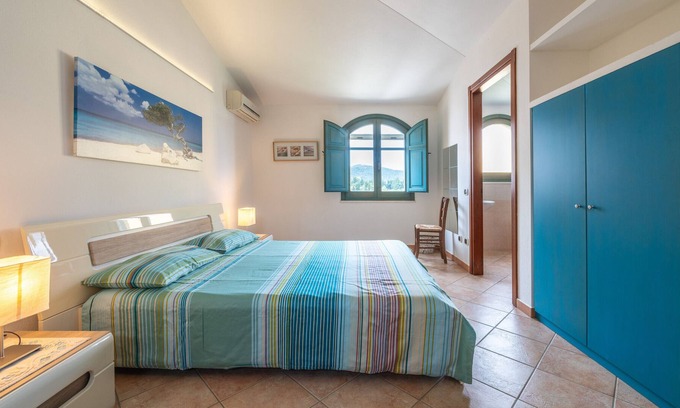 Muravera Apartment | Holiday Apartment 'Casa Mariella' with Mountain View, Terrace & Air Conditioning