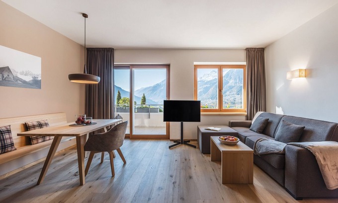 Schenna Apartment | Holiday Apartment "Charming Frida Residence Dornsberg" with Mountain View & Indoor Pool