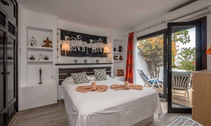 Playa Blanca Apartment | Holiday Apartment "Puerto Chico I & J" with Sea Views, Private Terrace, Shared Pool & WiFi