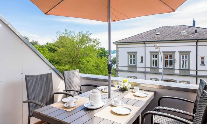 Radolfzell am Bodensee Apartment | Holiday Apartment "Haus Behr am See" with 2 Balconies and Lake View