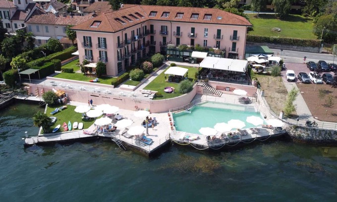 Meina Apartment | Holiday apartment with air conditioning, balcony and WLAN