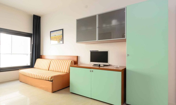 Lignano Sabbiadoro Apartment | Holiday apartment with balcony, air conditioning and internet