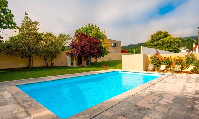 Afife House | Holiday Home 'Casa Das Camelias' with Sea View, Private Pool and Wi-Fi