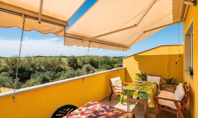 Giba House | Holiday Home 'Domus Luna' with Lake View, Terrace & A/C