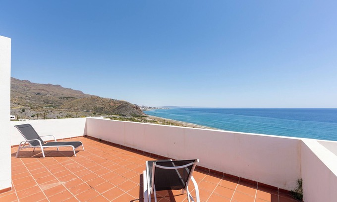 Playa Macenas House | Holiday Home 'Duplex Jlc' with Sea View, Shared Pool and Air Conditioning