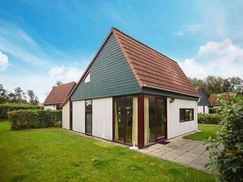 Heinkenszand House | Holiday Home in Zeeland near Lake & Sauna