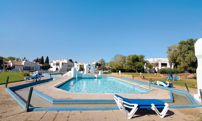 Santa Luzia House | Holiday Home 'Terrace 19B' with Sea View, Shared Pool and Air Conditioning