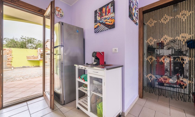 Castiadas House | Holiday Home 'Villetta Olia Speccciosa' with Private Garden, Balcony and Air Conditioning