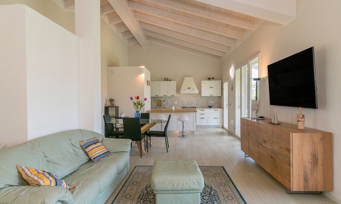 Cecina House | Holiday Home 'Villetta Matilde' with Private Terrace, Private Garden and Air Conditioning