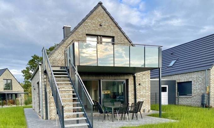 Barssel House | Holiday house Panoramadeck on Lake Harkebrügger See with sauna and fireplace
