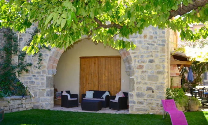 Lagrasse Apartment | Holidays in Lagrasse. Stunning medieval apartment set in walled garden with pool