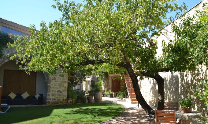 Lagrasse Apartment | Holidays in Lagrasse. Stunning medieval apartment set in walled garden with pool