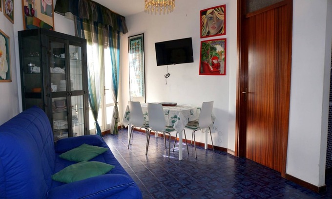 Porto Santa Margherita Apartment | Homely flat for 4 guests