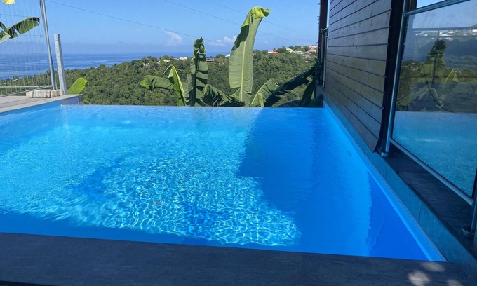 Marigot House | Homerez - Amazing bungalow 6 km away from the beach for 2 ppl. with shared pool