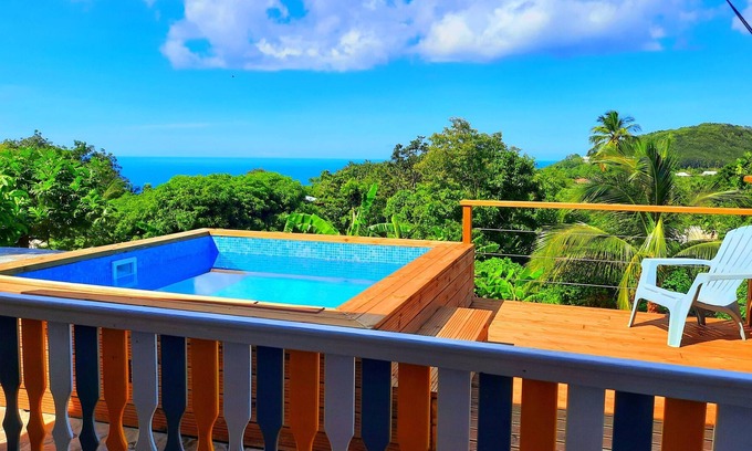 Cafeiere House | Homerez - House for 3 ppl. with swimming-pool, sea view and garden at Deshaies