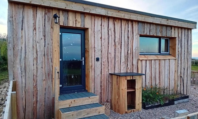 Forres House | Honeysuckle Straw Bale Cabin