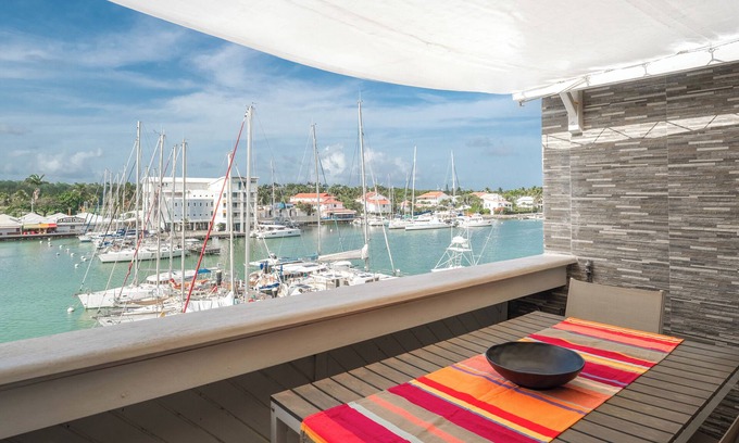 Saint-Francois Apartment | Honoré apartment with views of the marina and golf course 2mn from beaches