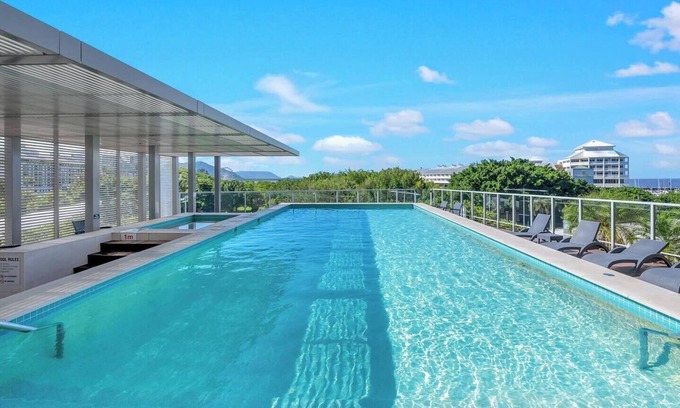 Cairns Central Business District Apartment | Horizons at Harbour Lights Tropical Poolside Flair