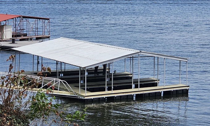 Tia Juana Cabin | Hot tub, boat dock and lakeside with this snug small cabin. TINY BEDROOMS