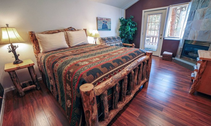 Estes Park Condo | Hot tub suite with full kitchen, patio with river view