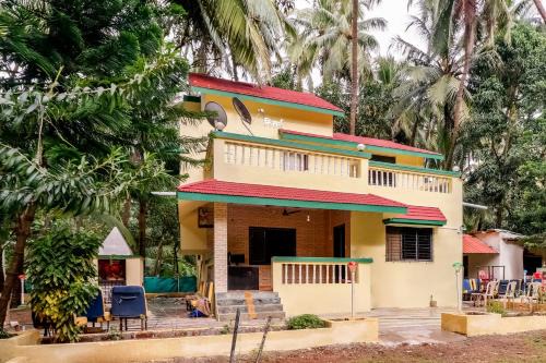 Palghar Hotel | Hotel O Nisarg Resort Satpati Beach