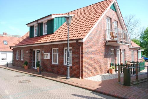 Neuharlingersiel Apartment | Hotel und Ferienwohnung Rodenbäck