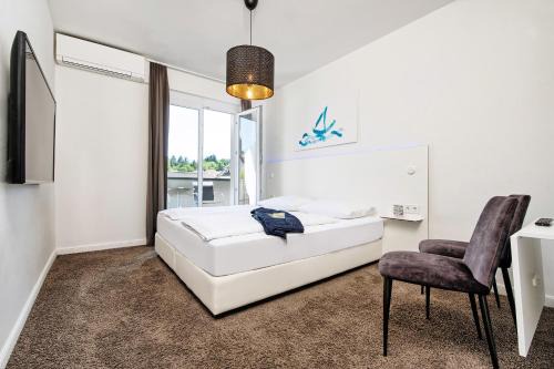 Velden am Worther See Hotel | Hotel Velden - 24 Checkin Zimmer im Zentrum