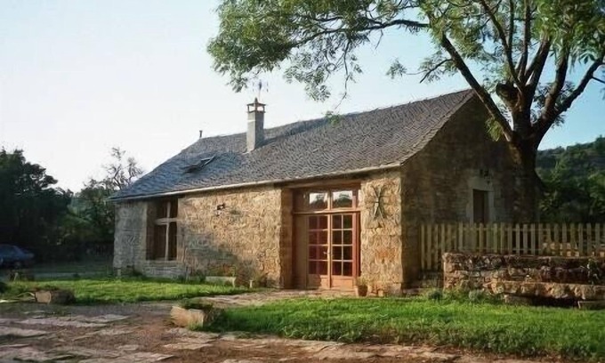 Buzeins House | House: barn facing a castle in unspoilt countryside
