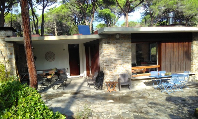 Roccamare House | House by the sea in a light pine forest