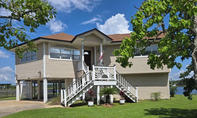 Gulfport House | House on the back bay with a boat launch, two kayaks and a pedal boat on site!