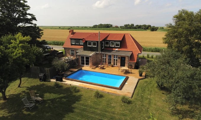 Norden House | Huus an`t Diek, luxury near the dike, first floor apartment with pool near Norddeich