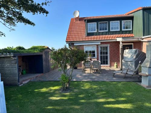 Ostermarsch House | "Huus ant Diek", Ferienhaus mit Maisonette Wohnung in Deichnähe, Nähe Norddeich