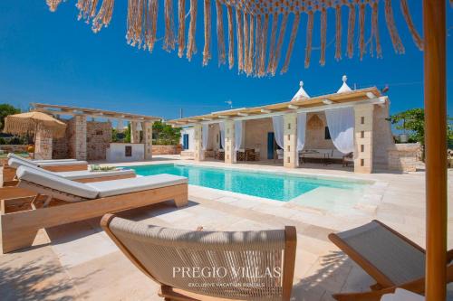 Martina Franca Villa | I Trulli del Tarassaco with private pool by Pregio Villas