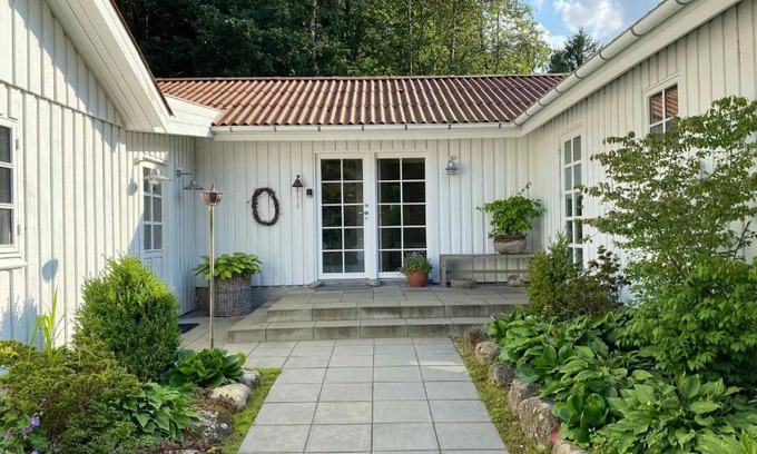 Viborg House | Idyllically Situated Wooden House By The Forest