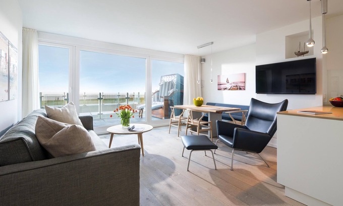 Norderney Apartment | In Absoluter Traumlage in Erster Reihe am Meer Befindet Sich das Haus "columbus"