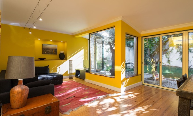 Sacramento Apartment | In Chiado quarter, the luxury of a patio and a garden in a refined cozy flat