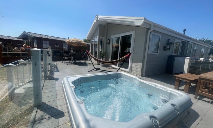 Tattershall Cabin | Indulgence Lakeside Lodge i1 is prime location with private fishing peg and hot tub at Tattershall