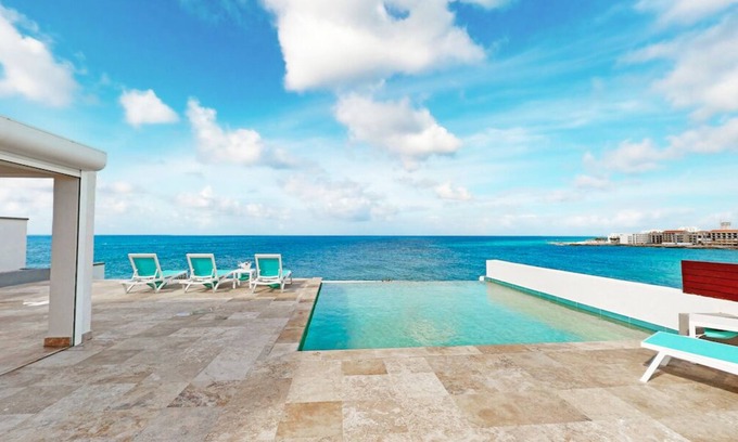 Beacon Hill Condo | ☀️ Infinity by IRE Vacations - Luxury Oceanfront Penthouse with Rooftop Pool