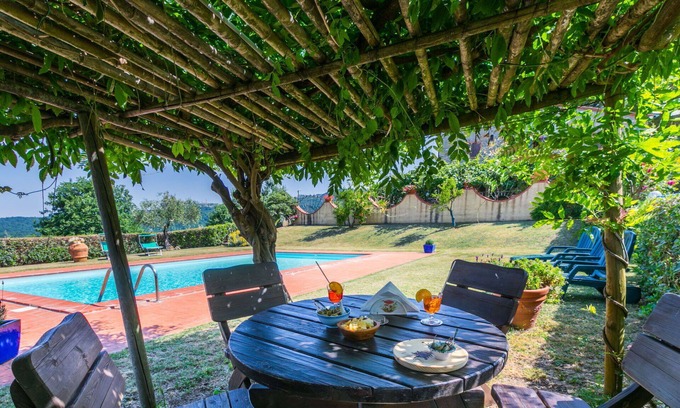 Castelnuovo di Val di Cecina Apartment | Cosy apartment for 4 people with WIFI, pool, A/C, TV, patio and pets allowed