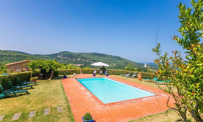 Castelnuovo di Val di Cecina Apartment | Lovely apartment for 12 guests with pool, A/C, WIFI, TV, patio and pets allowed