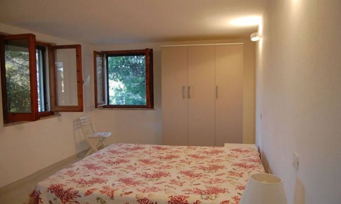 Torre delle Stelle House | Appartamento con Giardino e Vista Mare a 100 Metri Dalla Spiuaggia
