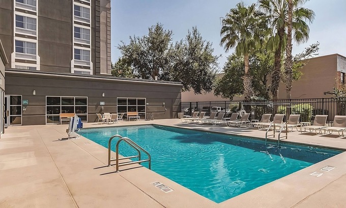 Downtown San Antonio Hotel | Jetted Tub Deluxe King Suite, Pet-Friendly, Near San Antonio Missions Park