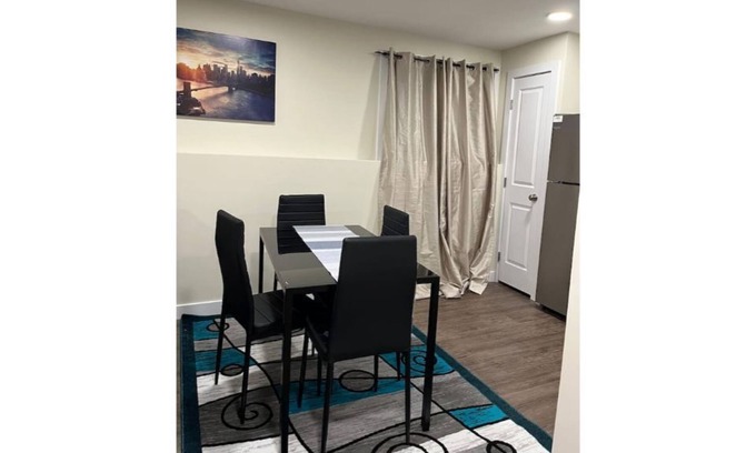 Saskatoon Apartment | Kick back & relax in this calm, stylish space.