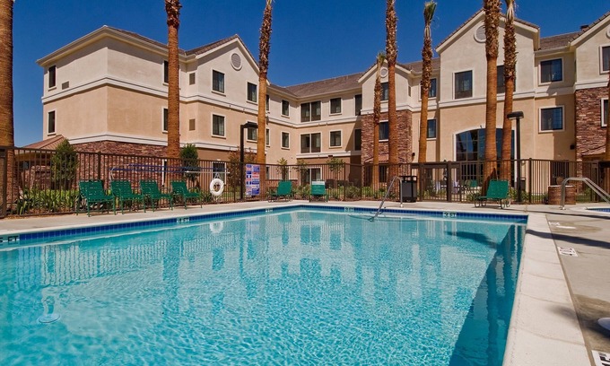 Palmdale Apartment | King Suite. Free Breakfast. Outdoor Pool & Hot Tub. Near Edwards Air Force Base!