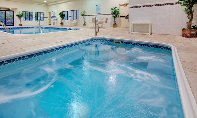 Peoria Apartment | King Suite. Free Breakfast. Pool & Hot Tub. Great for Business Travelers!