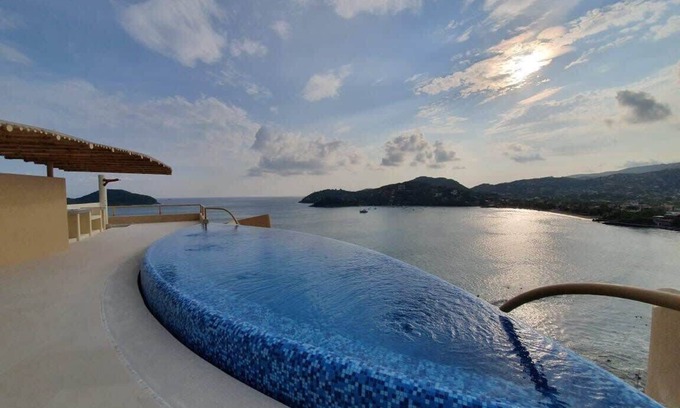 Playa la Madera Villa | KK 202 Villa, Enjoy stunning sunsets in this luxury condo