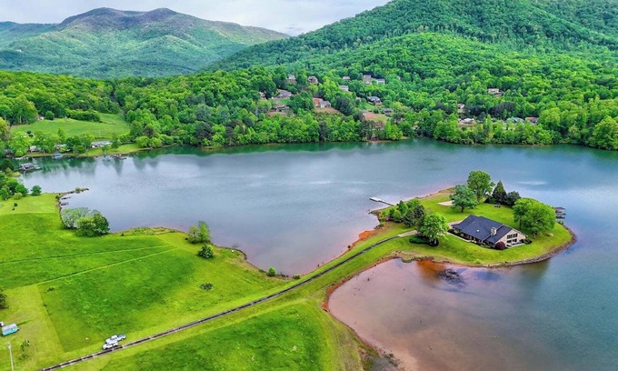 Hiawassee House | Lake Haven on Chatuge - By Chatuge Home Concierge Indoor Pool, covered boat slip, swim dock, hot tub, firepit , beach sand volleyball , kayaks