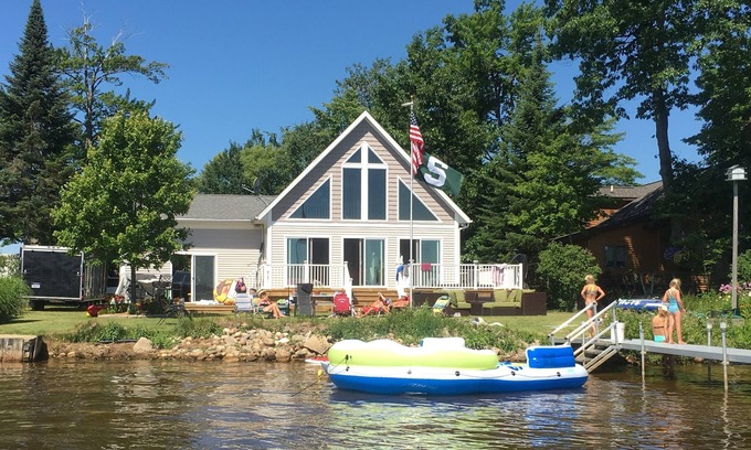 Cadillac House | Lake Mitchell Cottage- Sleeps 10-12 comfortably. Great location with Sandy Beach