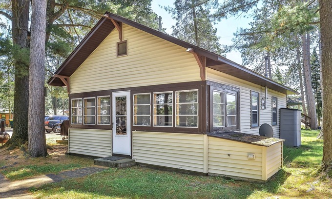 St Germain Cabin | Lake view, dog-friendly cabin with porch & shared dock, swimming area, firepit