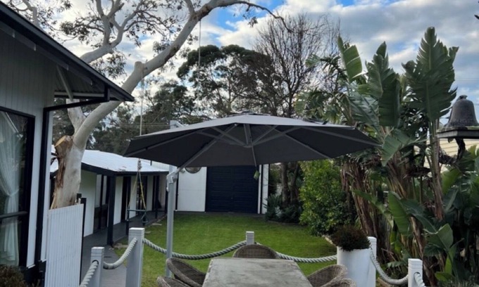 Cannons Creek House | Lake View Pet Friendly Home Equipped With Fishing Rod, Kayaking or Bike Riding